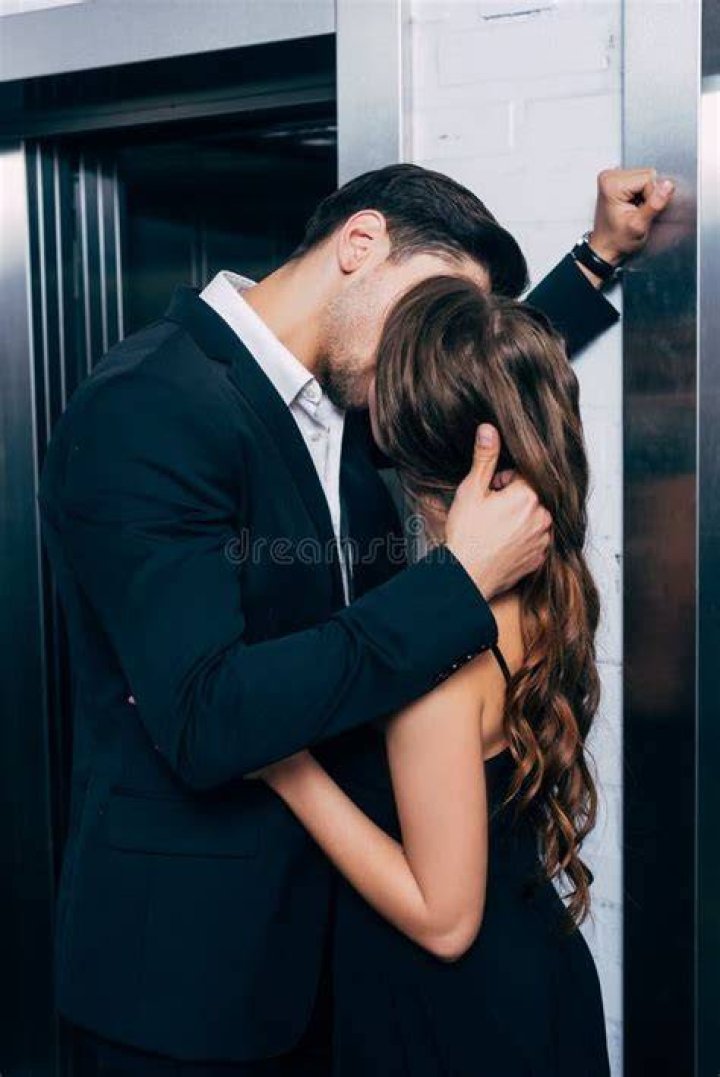man and woman passionately kissing