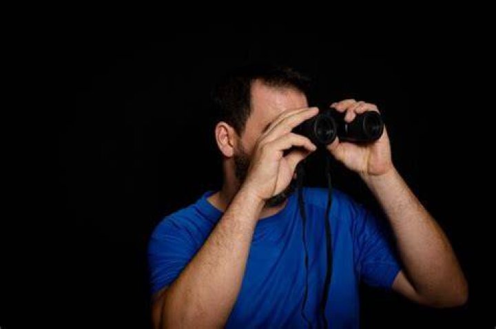 Man holding binoculars