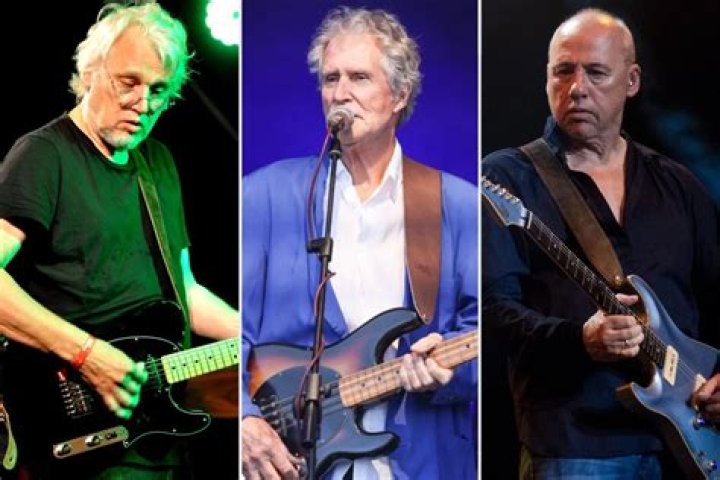 Mark Knopfler, David Knopfler, John Illsley and Pick Withers of the Dire Straits in concert June 1983.