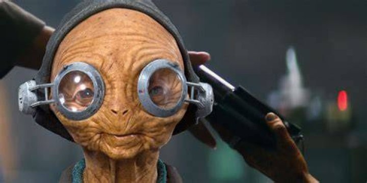 Maz Kanata and Skywalker Lightsaber in Star Wars The Force Awakens