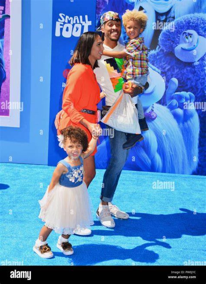 Michael Beasley and family, wife and kids attends the premiere of