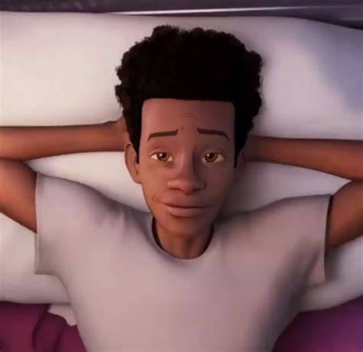 Miles Morales lying in bed in Spider-Man: Across The Spider-Verse