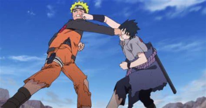 Naruto and Sasuke land punches on one another in Naruto Shippuden