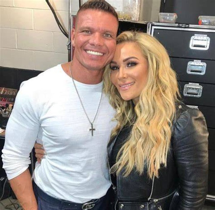 Natalya locking Tyson Kidd in a sharpshooter