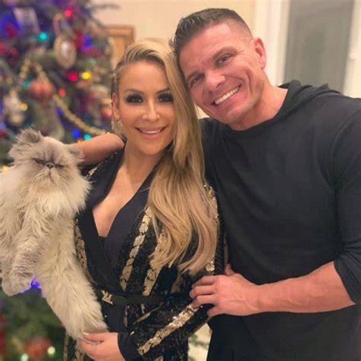 Natalya with an inured Tyson Kidd