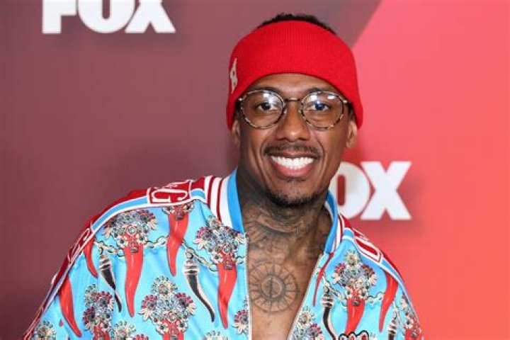 Nick Cannon displays his tattooed neck and back | Image: Pinterest