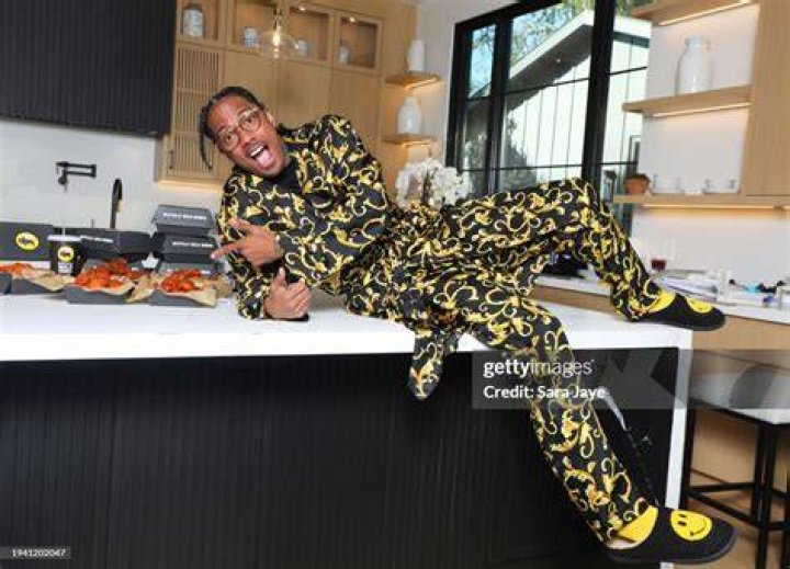 Nick Cannon gets saucy on the set of his Buffalo Wild Wings