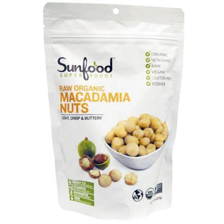 organic macadamia nuts on a wooden table
