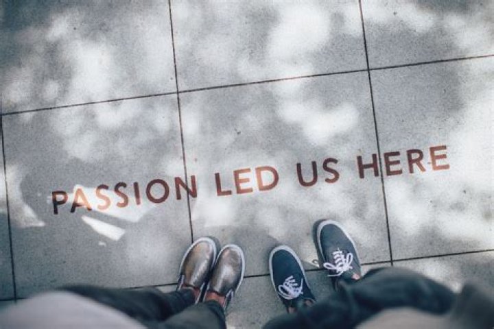 Passion led us here written on a sidewalk