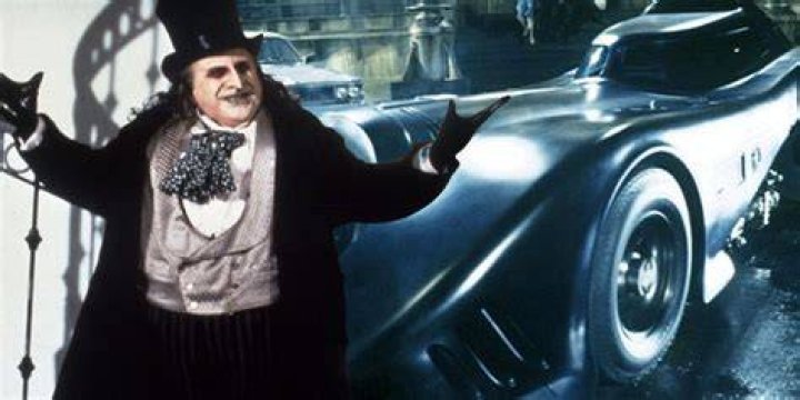 Penguin seeing the Batmobile in his side view mirror in The Batman
