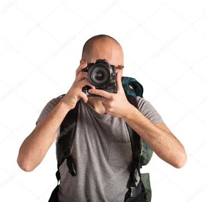 person taking photos on top of a mountain