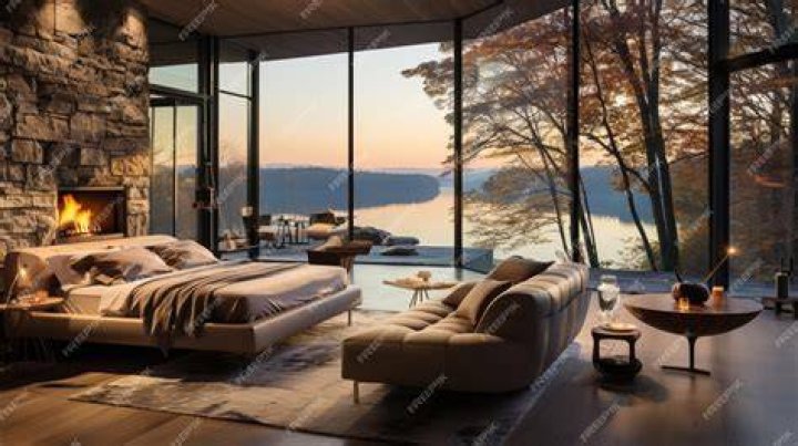 Primary bedroom with floor-to-ceiling views of the Midtown skyline