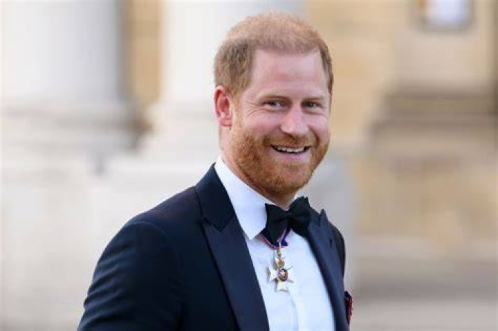 Prince Harry, Duke of Sussex, Meghan, Duchess of Sussex and their baby son Archie Mountbatten-Windsor meet Archbishop Desmond Tutu during the royal tour of Africa. Photo / Getty Images