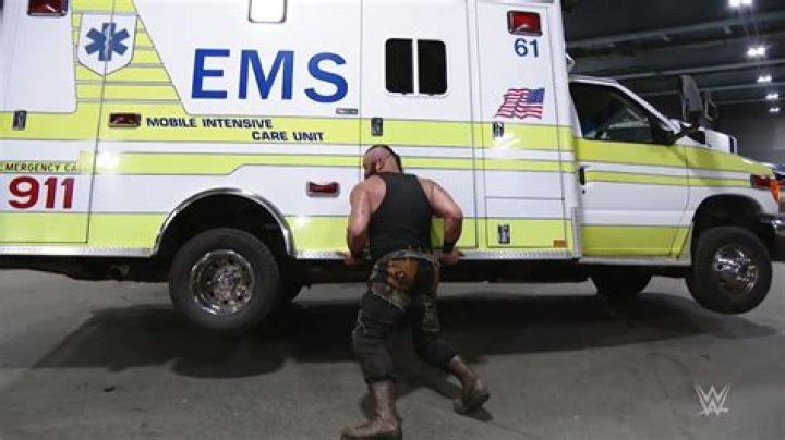 Roman Reigns driving an Ambulance