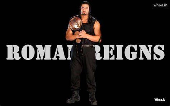 Roman Reigns posing on the entrance ramp. 