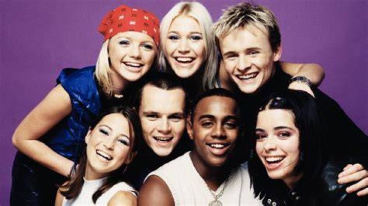 S Club 7 members Jo O'Meara (left), Rachel Stevens, John Lee, Tina Barrett, Bradley McIntosh, Hannah Spearritt and Paul Cattermole at the Disney Channel Kids Awards held at the London Arena in London, 1999. Photo / AP