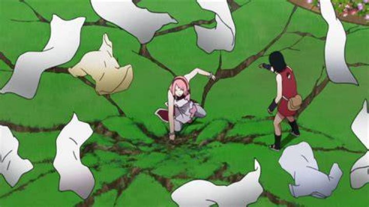 Sakura pokes Sarada in the forehead in a Boruto flashback