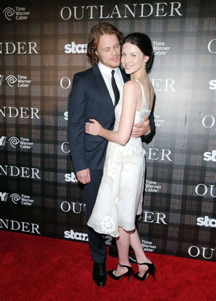 Sam Haughan and Caitriona Balfe share a wistful goodbye in the new