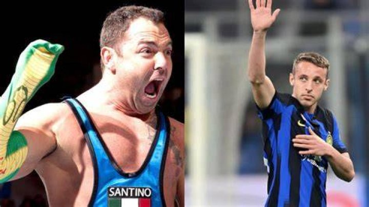 Santino Marella wearing "The Cobra" sock on his hand