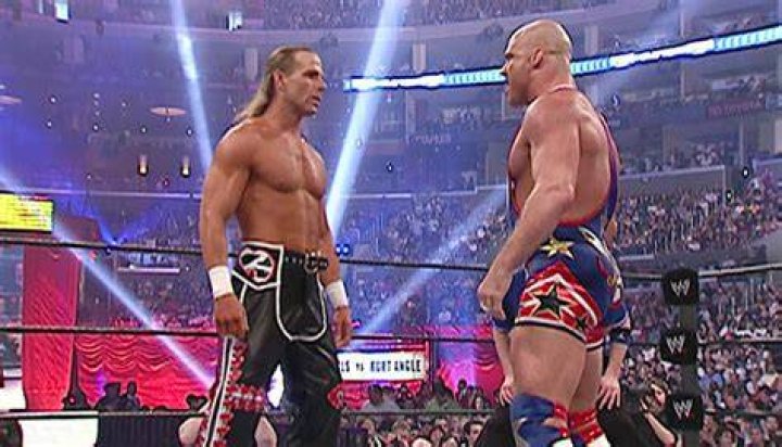 Shawn Michaels and Kurt Angle staredown Cropped
