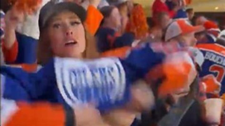 Shock moment fan flashes boobs in crowd during NHL match in moment of