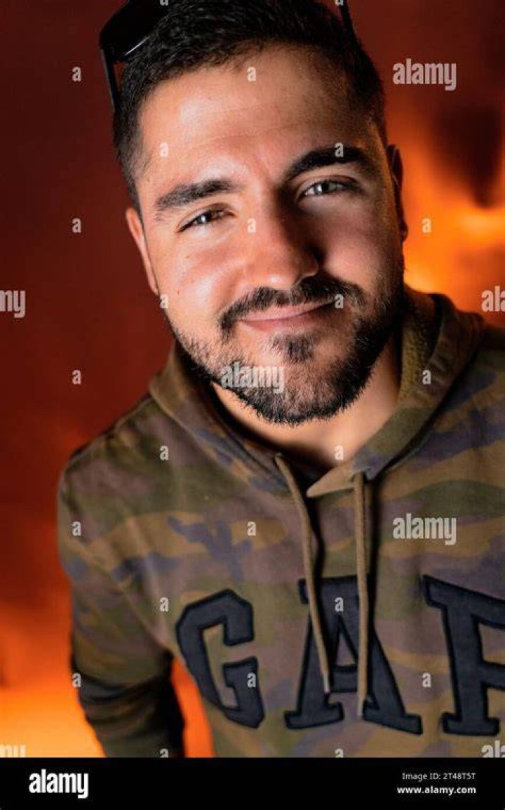 shot of a young man suffering from a cold at home