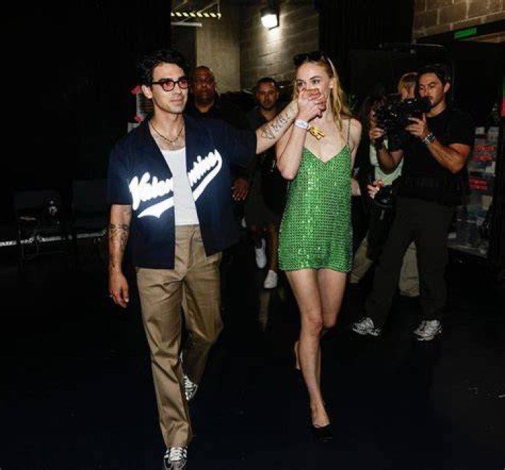Sophie Turner Looks Fab in Green Minidress While Supporting Joe Jonas Backstage