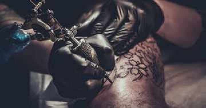 South African Lady Gets Infection After Getting Large Leg Tattoo, Fans Weigh In on Viral Videos: “It’s Scary”