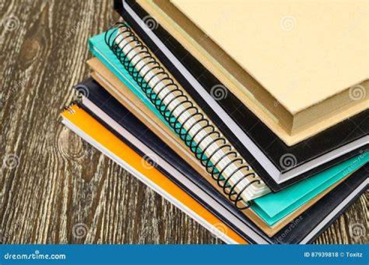 Stack of workbooks and notebooks
