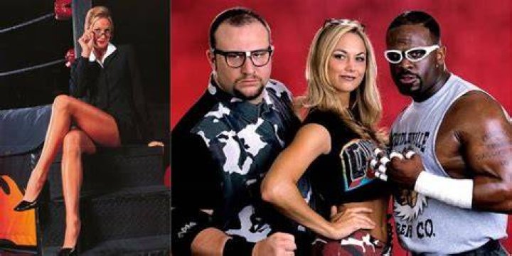 Stacy Keibler with the Dudley Boyz