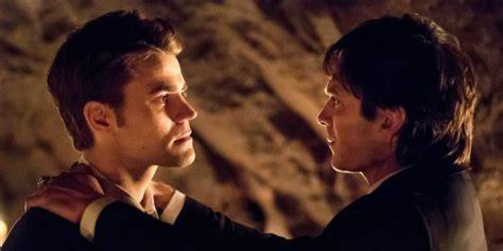 Stefan and Damon embrace in The Vampire Diaries