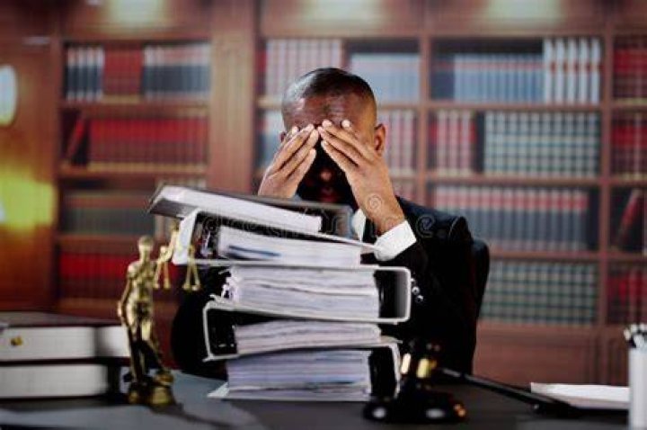 Stressed male lawyer stressed male lawyer