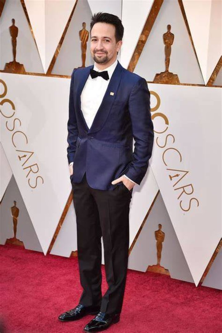 Suit, Formal wear, Red carpet, Carpet, Tuxedo, Premiere, Blazer, Outerwear, Flooring, Event, 