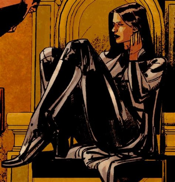 Talia al Ghul sitting on a throne.