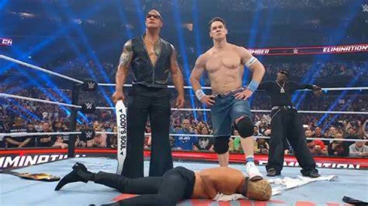 The Rock attacks John Cena