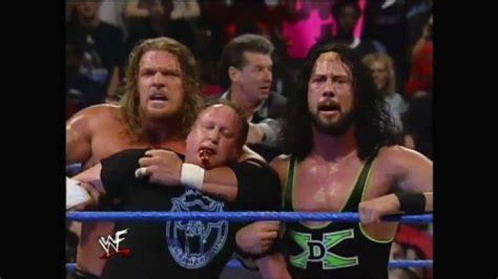 Triple H and Earl Hebner