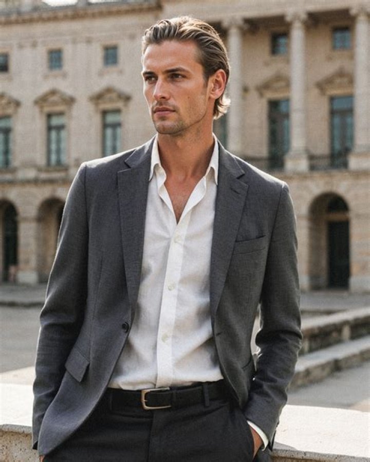 Trousers, Stairs, Collar, Shirt, Suit trousers, Outerwear, Standing, Coat, Formal wear, Suit, 