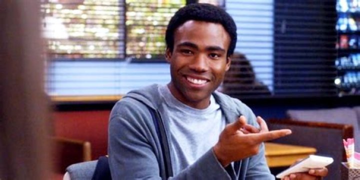 Troy Barnes, Donald Glover in Community with a hand puppet
