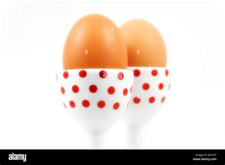 two eggs with red spots on them two eggs with red spots on them