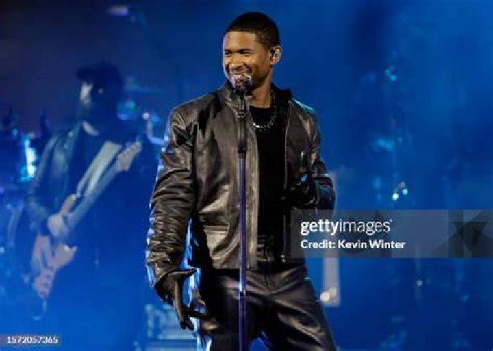 Usher performs onstage during the Apple Music Super Bowl LVIII Halftime Show