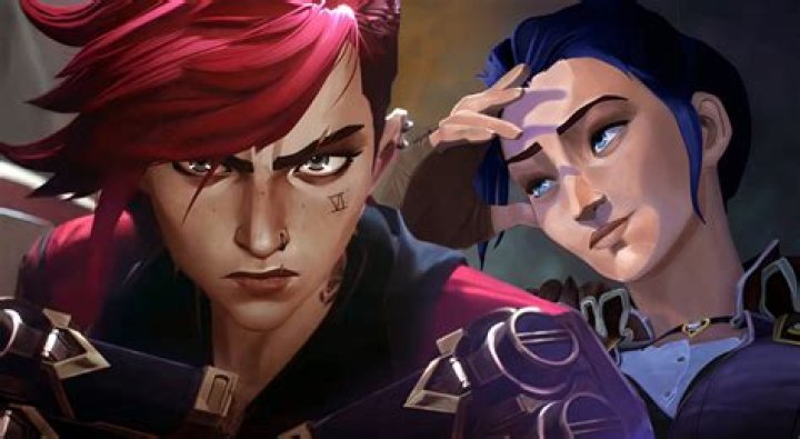 Vi and Caitlyn from Arcane, holding their faces tantalisingly close together