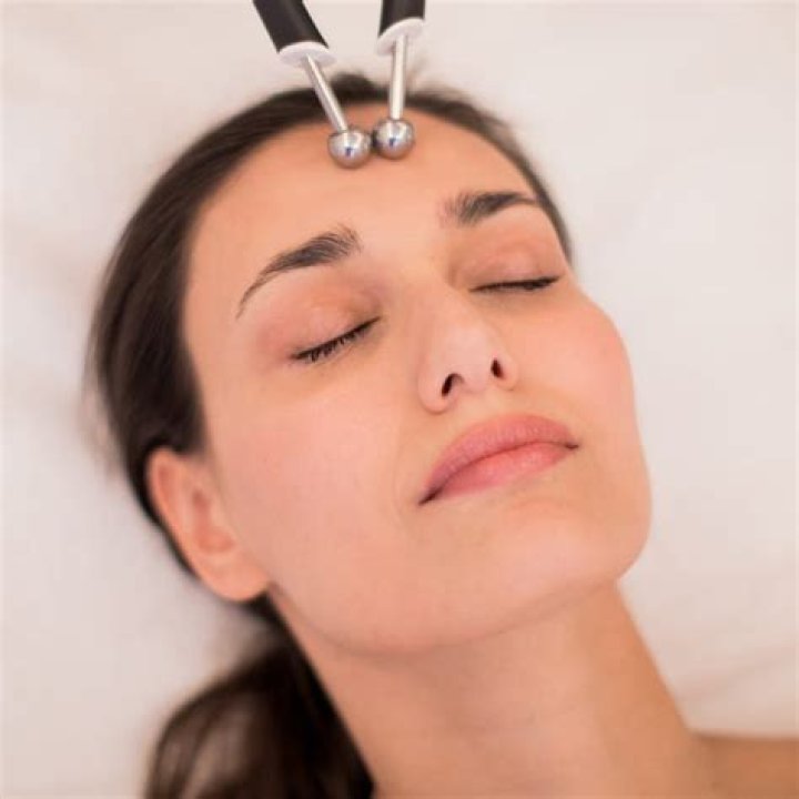What Are Microcurrent Facials? Estheticians Weigh in on the Treatment and Devices
