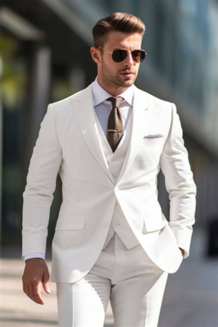 White, Suit, Fashion, Event, Fashion design, Formal wear, Outerwear, Pantsuit, Uniform, Performance, 