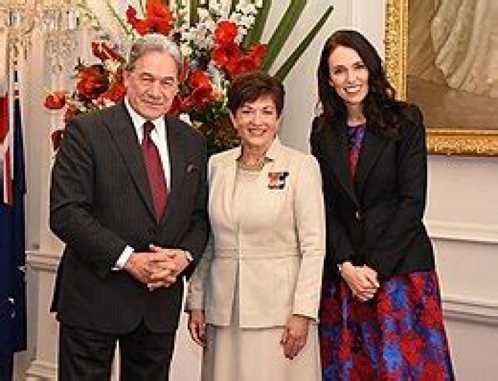 Winston Peters and Jacinda Ardern shaking hands after signing their coalition agreement post the 2017 General Election. Photo / Mark Mitchell