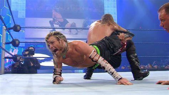 WWE Edge Executing A Submission On Jeff Hardy In A Match