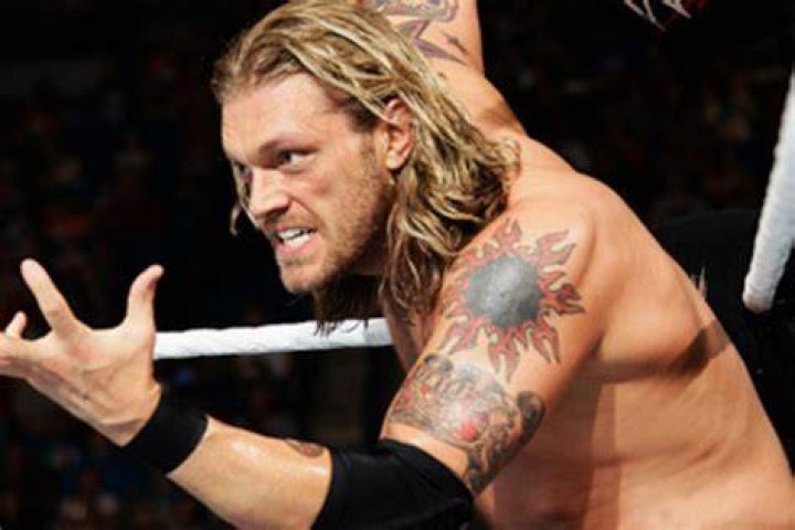 WWE Edge Surrounded In The RIng By John Cena, Shawn Michaels And Triple H