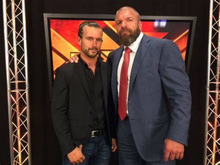 “You’re a professional button pusher”- Triple H takes a dig at Pat McAfee in
defense of Adam Cole