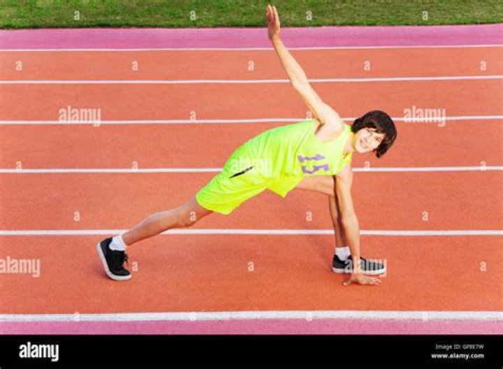 young athlete exercising outdoor in the park