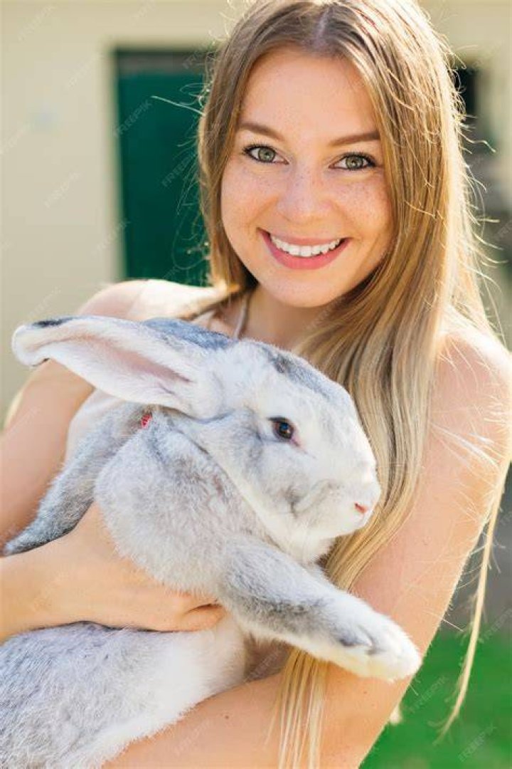 young woman with cute rabbit