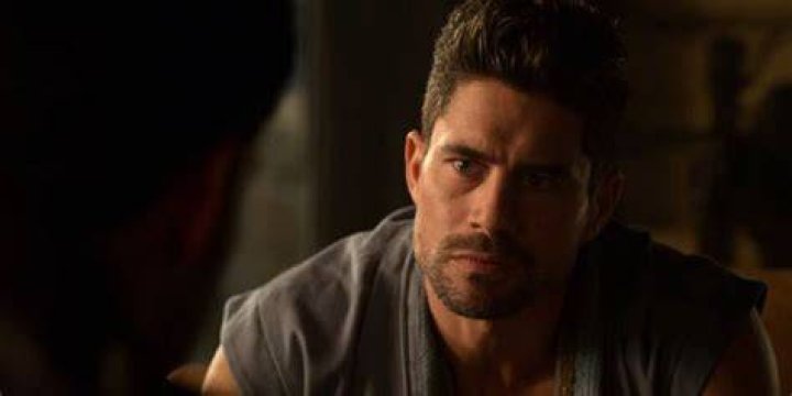 Zadkiel leaning forward towards Lucifer in Lucifer